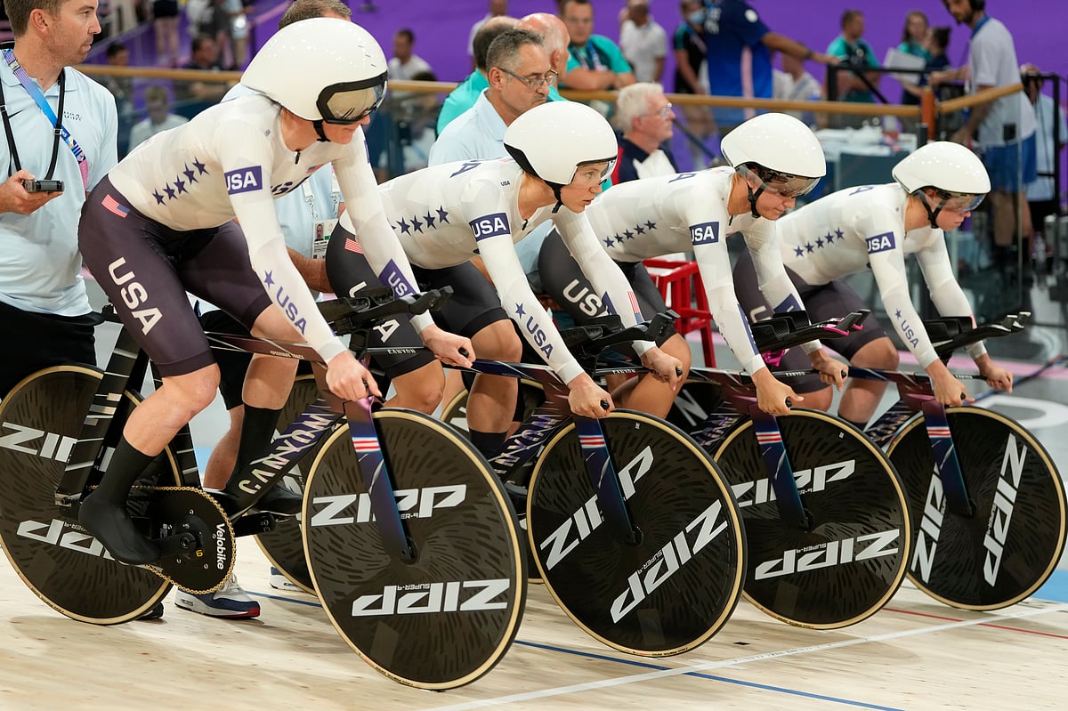 (AP Photo/Ricardo Mazalan) : United States' Jennifer Valente, Lily Williams, Chloe Dygert and Kristen Faulkner start the women's team pursuit event, at the 2024 Summer Olympics, Tuesday, Aug. 6, 2024, in Paris, France. 